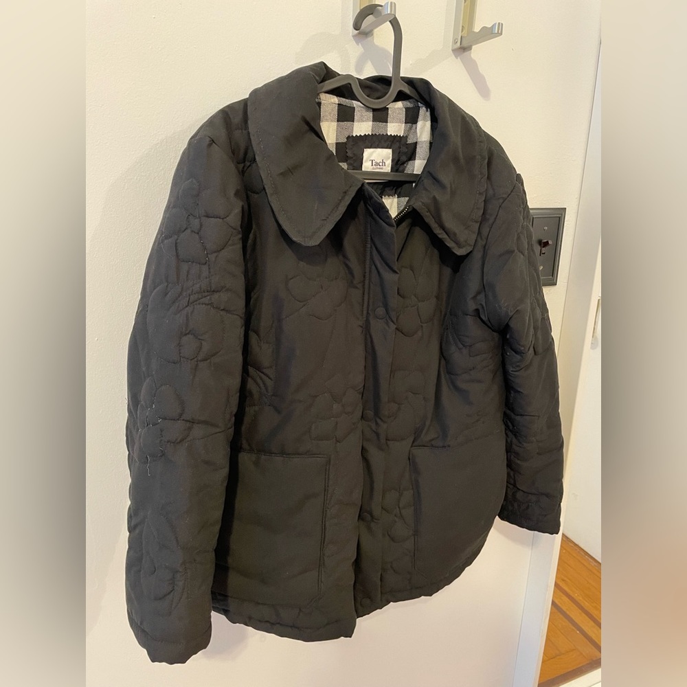 Black quilted jacket by Tach Clothing